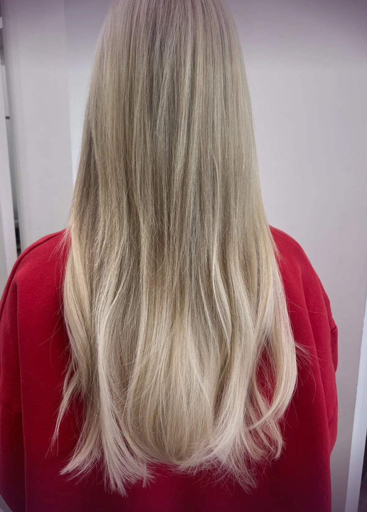 After a tape-in hair extension appointment, color-matched for added length and density